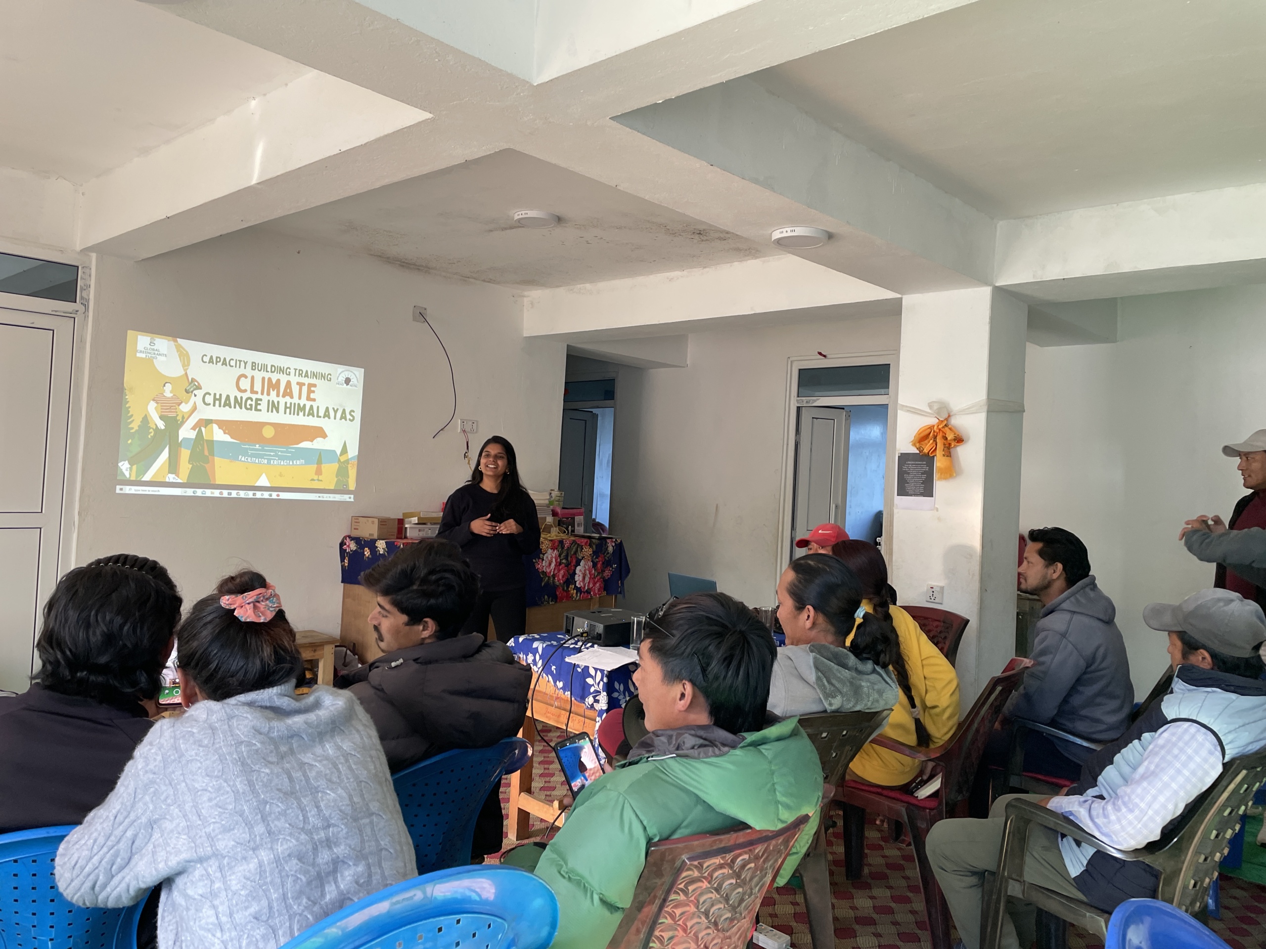 People inside at a HEAD Nepal training on climate change.